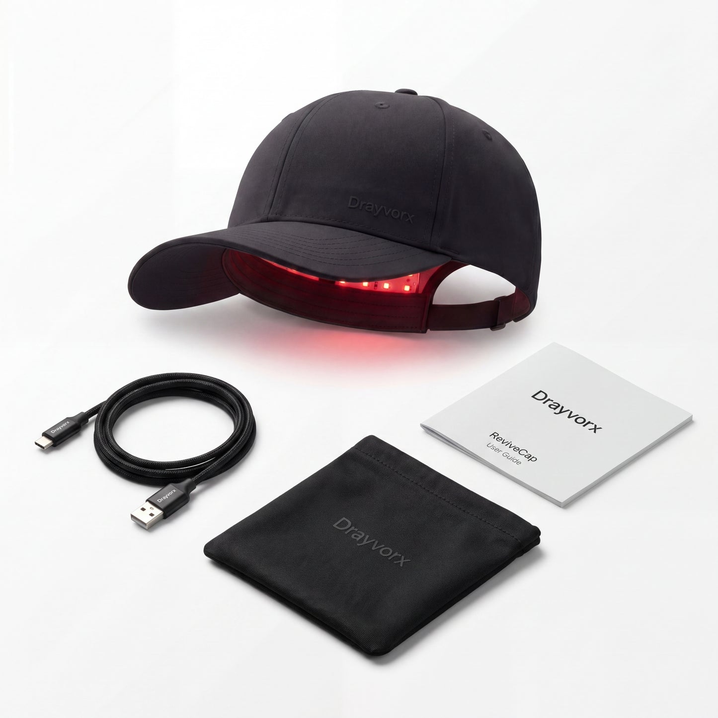 Drayvorx ReviveCap unboxing — laser cap, controller, USB-C cable, and quick-start guide
