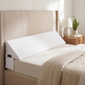 Drayvorx AirWedge white wedge pillow tucked between mattress and headboard, full bed width